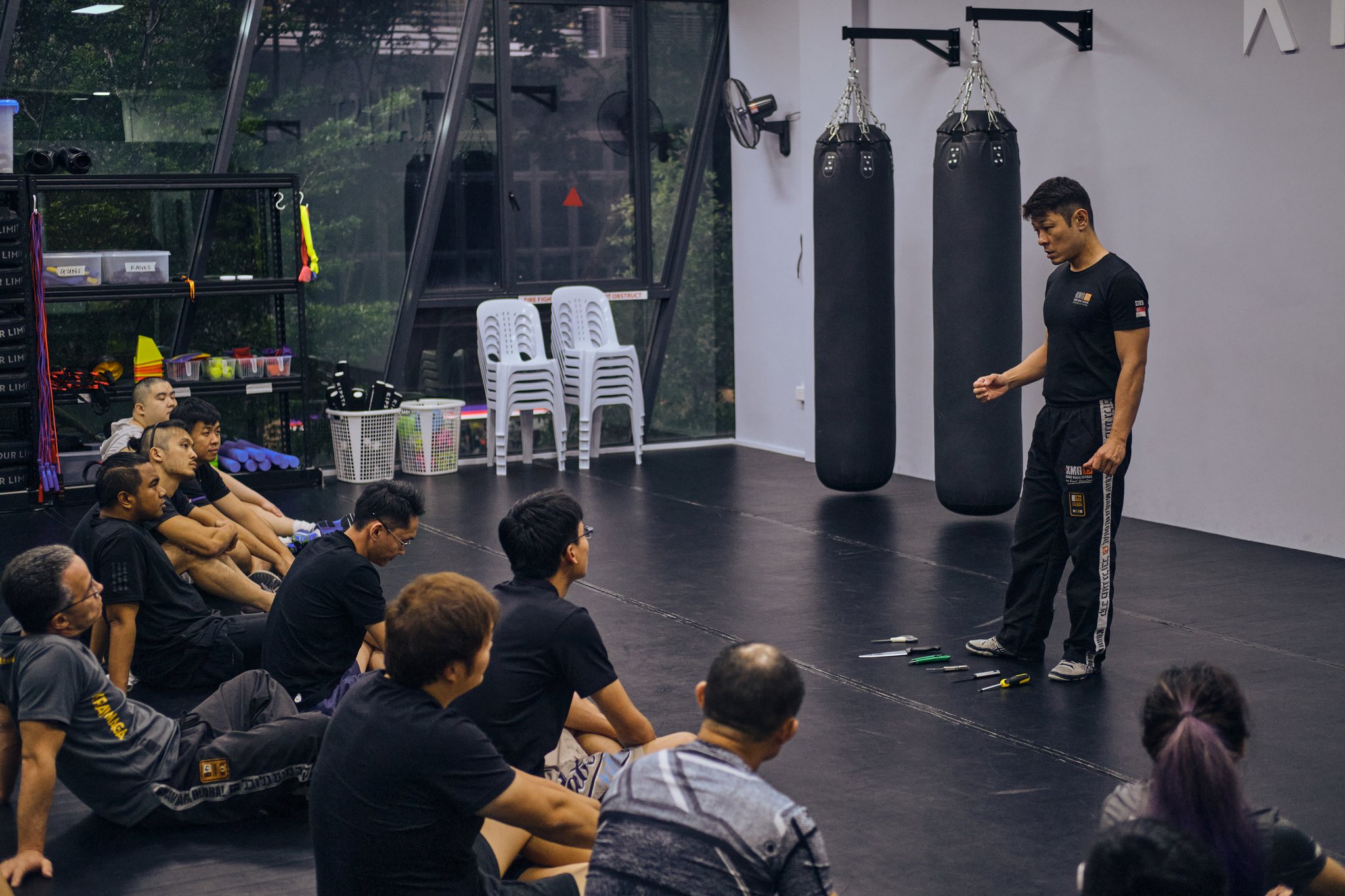 Kravist instructor briefing adult students